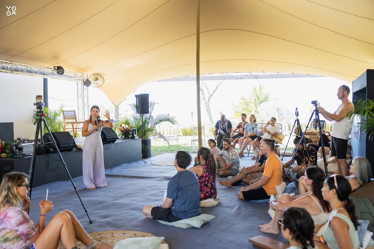 Paola speaking to an audience at a retreat